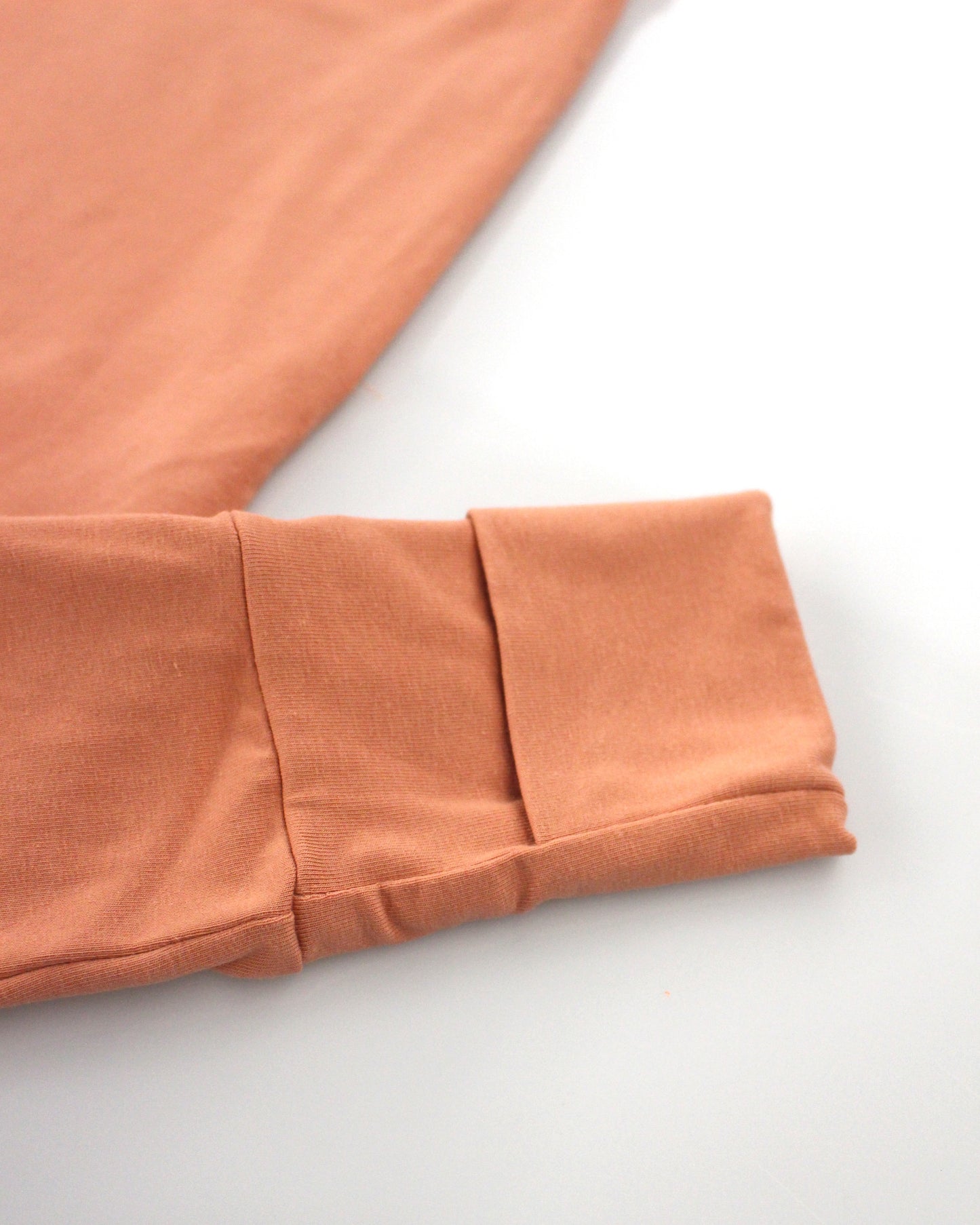 Grow-with-me Jumpsuit. Solid Coral
